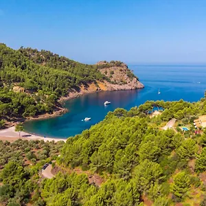 By Interhome Ferienhaus Cala Tuent